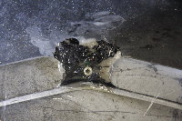 <p>Plan A to hold the mesh in place on the nose cone - fibre glassed a set of nuts to on to it, then bolt it on. Final status - Epic Fail. The nuts pulled out.</p>